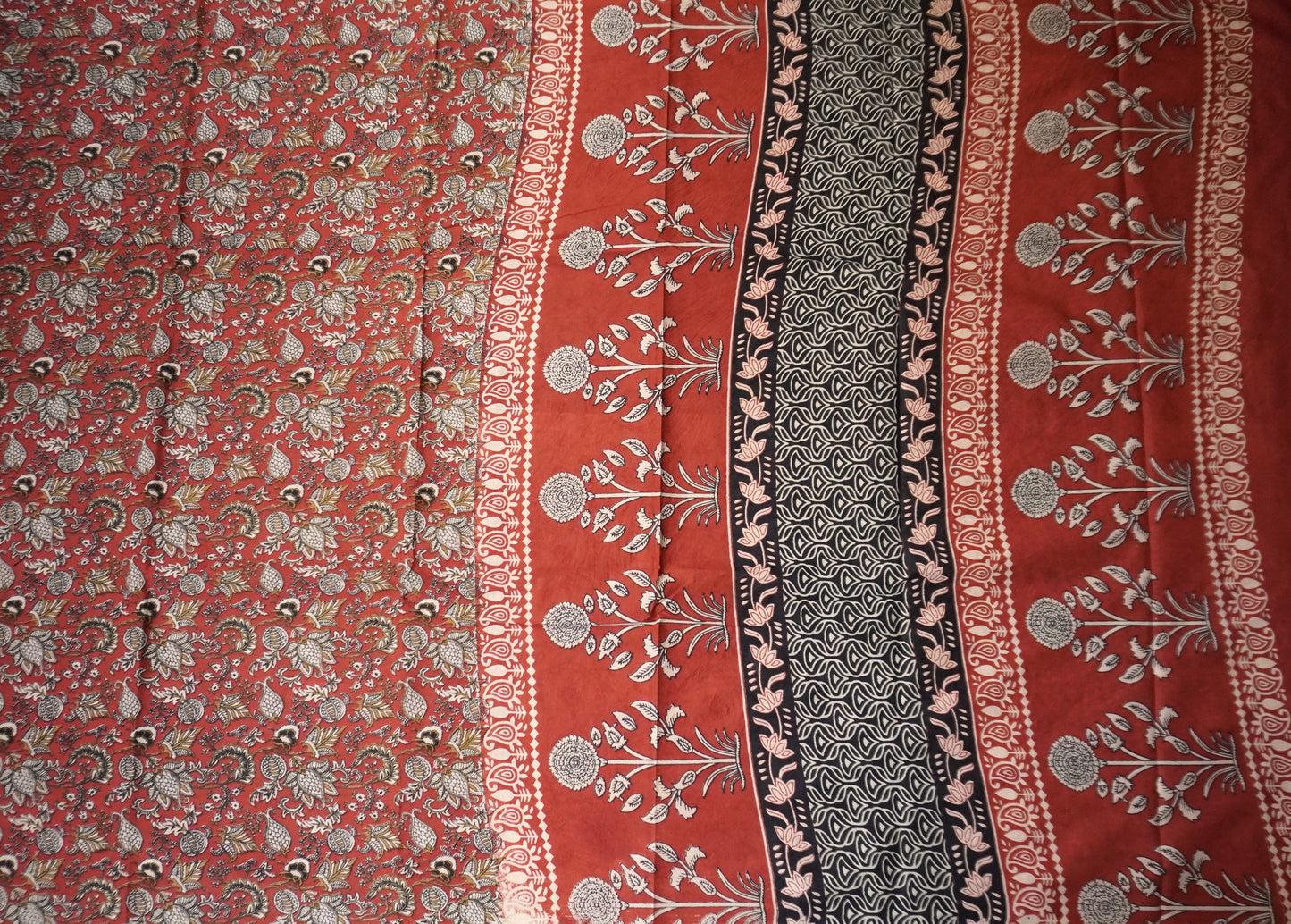 Rusty Red Mulmul Cotton Saree with Bold Ethnic Floral Print