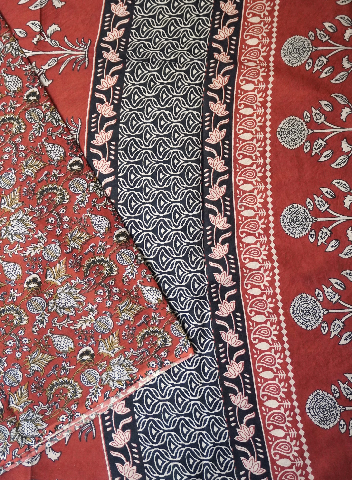 Rusty Red Mulmul Cotton Saree with Bold Ethnic Floral Print
