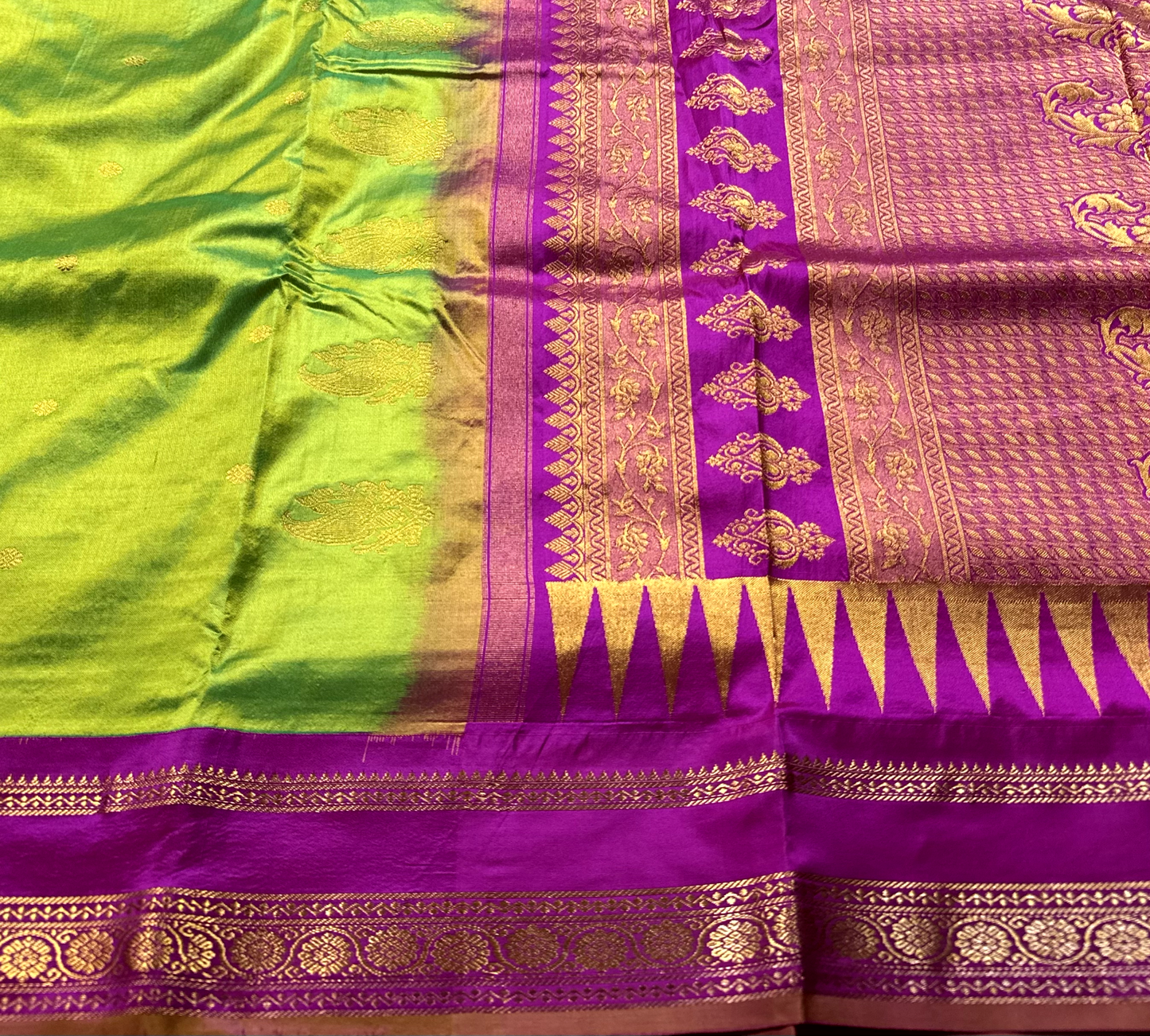 Parrot Green Pure Silk Gadwal Saree With Rani Pink Radha Rani Border