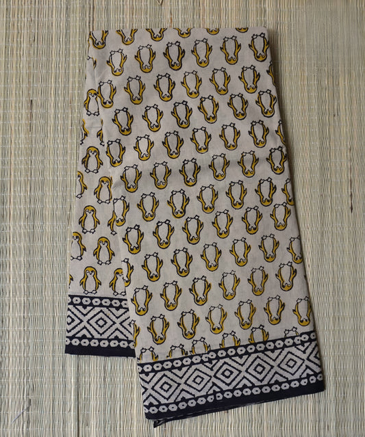 Beige & Yellow MulMul Cotton Saree with Penguin Block Prints