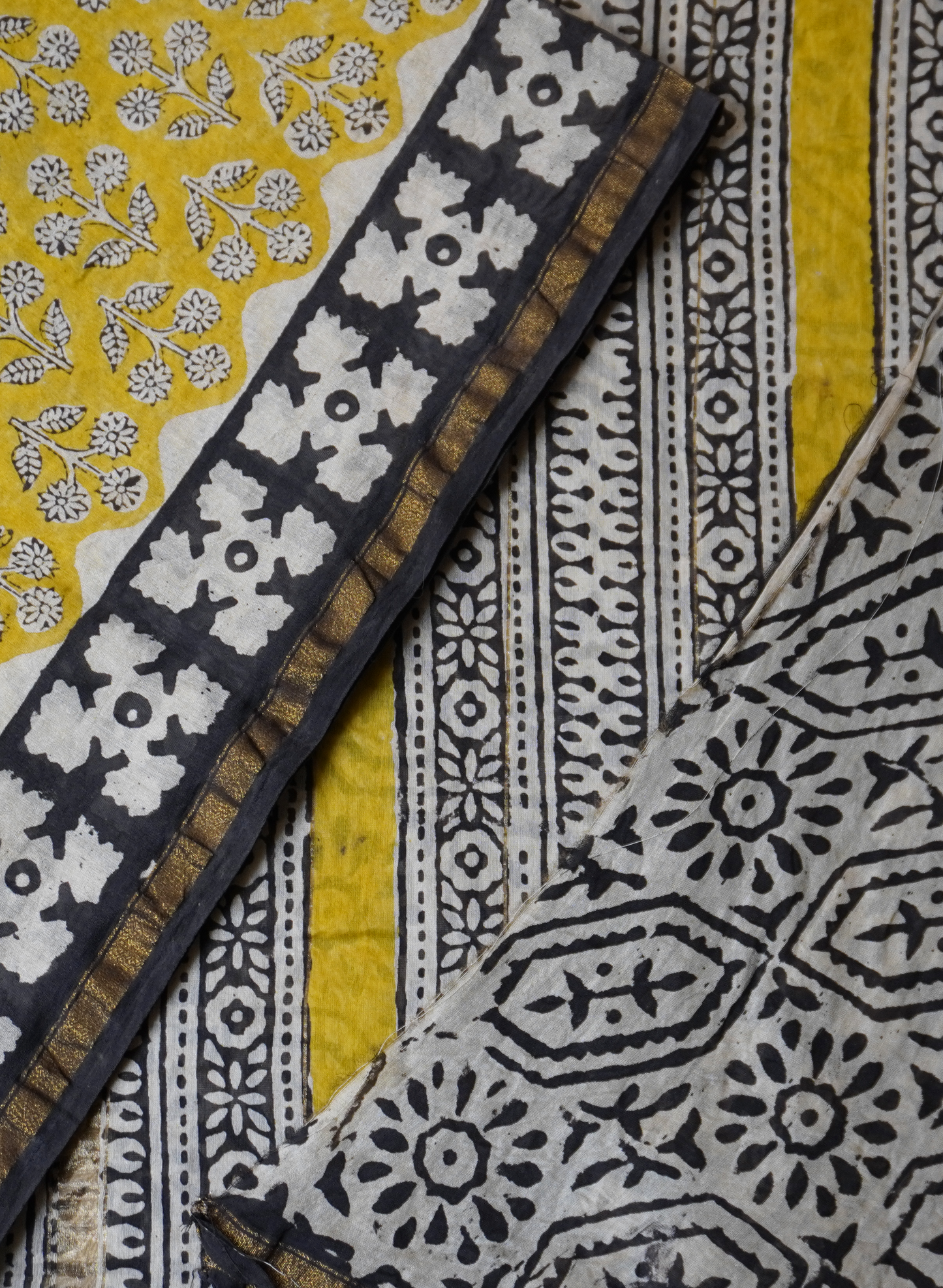 Yellow & Black Border Block Printed Chanderi Cotton Saree With Floral Motifs