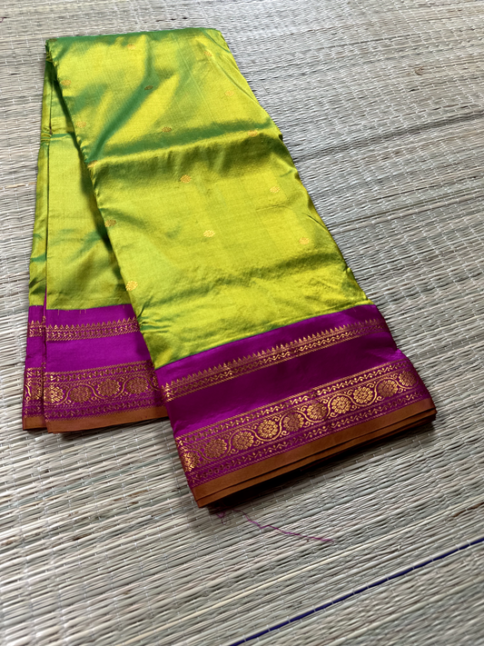 Parrot Green Pure Silk Gadwal Saree With Rani Pink Radha Rani Border